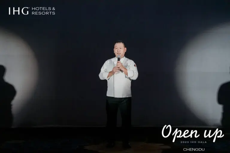 Chef Chew presenting at a gala dinner event