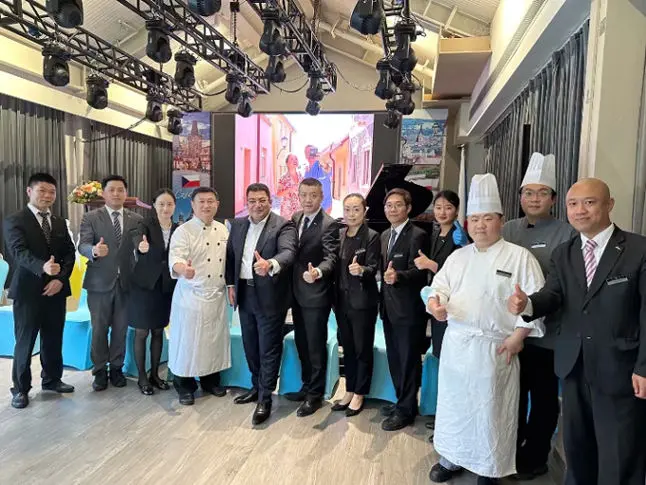 Magdy fifth from the left with associates at Czech Consulate in Shanghais outside catering service November 2023