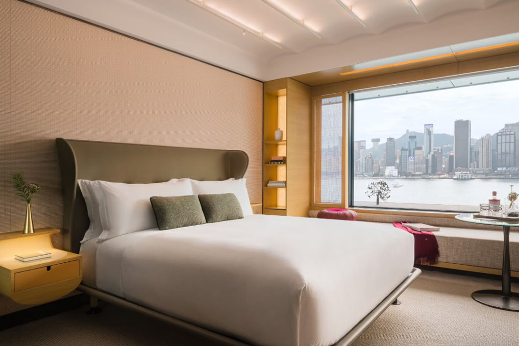 Classic Harbourview Room. Awe inspiring Framed Views of Victoria Harbour take centre stage in your Personal Haven. Enjoy the majestic view while relaxing on the windowfront daybed