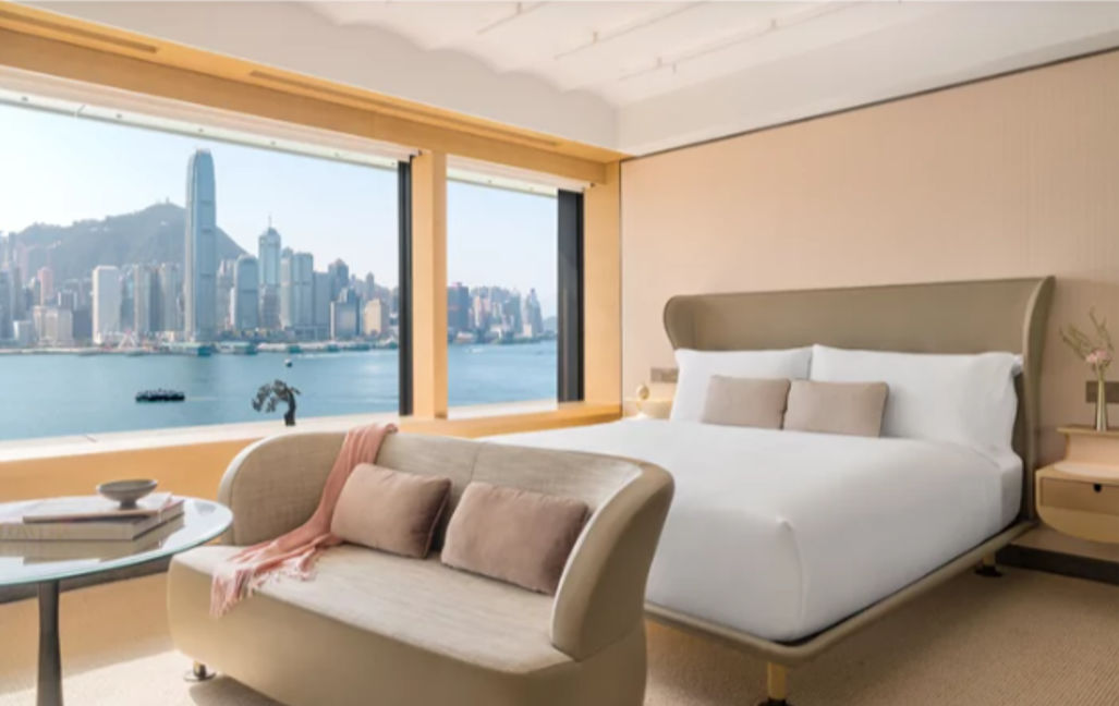 Premium Harbourview Room. Within a spacious sanctuary of calm overlooking Victoria Harbour gaze at the many wonders of Hong Kong. Feel revitalised with an immersive shower in the Oasis bathroom