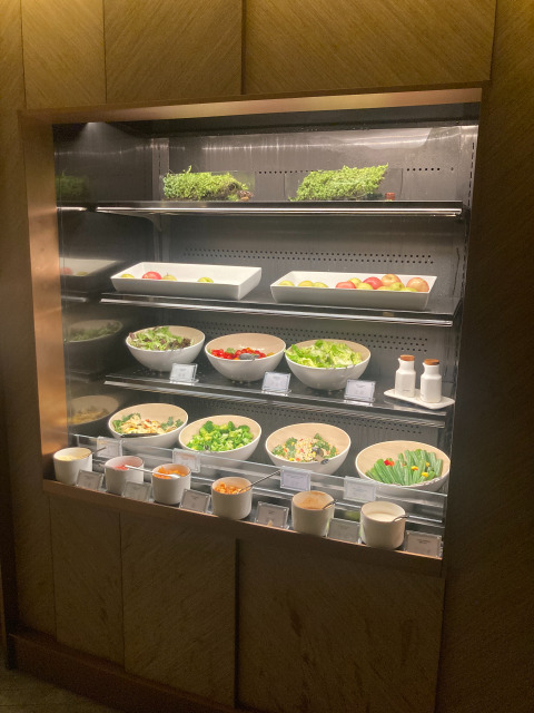 Self serve salad wall to eat healthy while traveling